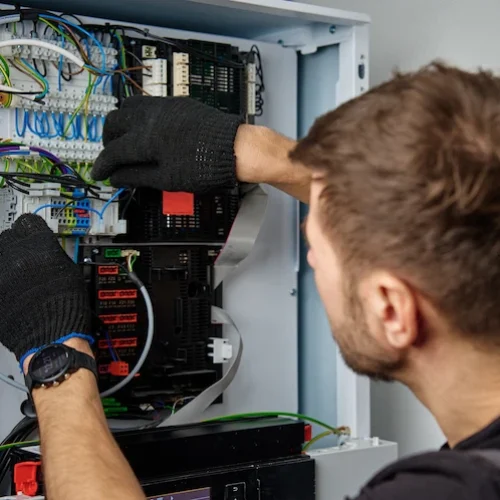 technician working on electrical control panel wir 2026 01 09 12 28 52 utc